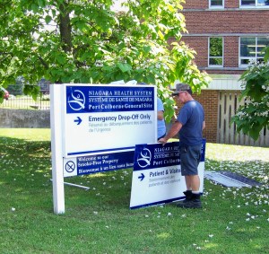 changing er sign at port hospital