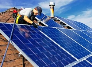Solar panels  being installed on a residential rooftop in somewhere U.S.A. 
