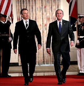 Tony Blair of Britain joins George W. in marching off to the war in Iraq