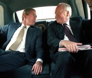 George W. Bush consults with his brain, Dick Cheney. Both men, who managed to avoid fighting in the Vietnam War decades earlier, have declared that they have no regrets about the Iraq War.