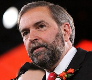 Canada's federal NDP leader, Thomas Muclair, embraces a Barack Obama future in Washington, D.C.