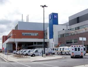 Patient transfer vehicles buzz in and out of west St. Catharines hospital site on first official day of hospital's opening. Photo by Doug Draper