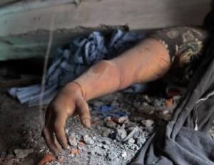 The hand and arm of this crushed Bangladesh garmet worker are there for the rest of us to see, if we choose to. I think of the young women who died in the Triangle Shirtwaste garment factory in New York City 102 years ago in similar slum conditions. When will it end? Is our craving for cheap goods worth these lives?
