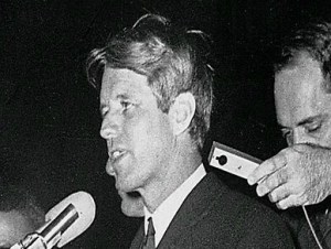 Robert Kennedy speaks to gathering of people in a neighbourhood in Indianapolis, Indiana on the eventing Martin Luther King was assassinated