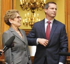 Ontario Premier Kathleen Wynne arm and arm with her old boss Dalton McGuinty. So where is the "new government."