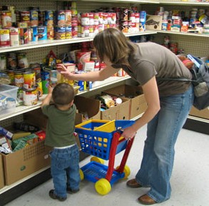 At the Food Bank. Report says growing numbers of Canadian children rely on food banks for basic nourishment needs. What's going on in this country?