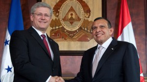 Canada's Prime Minister shakes hands two years ago on a trade deal with Honduras President Porfirio Lobo. Maybe great for the one per cent, but what is in it fr the majority of peoples in both countries, struggling to make ends meet.