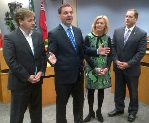 Inside Council Chambers at Niagara Falls City Hall, from left to right are Bart Maves, Ontario PC Candidate - Niagara Falls, Tim Hudak, Ontario PC Leader, Christine Elliott, Ontario PC Deputy Leader & Health Critic, Jim Diodati, Niagara Falls Mayor.  