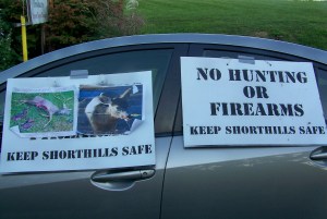 Signs like this ringed a public meeting this September over hunting deer this November in Niagara, Ontario's Short Hills Provincial Park. Photo by Doug Draper