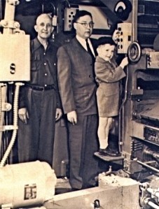 A young Henry Burgoyne with his father, then Standard publisher Bill Burgoyne, starts the presses for another daily run.
