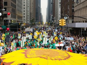 Many tens of thousands march through the canions of New York City for action on climage change