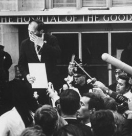 Frank Mankiewicz wipes away tears as he announces the death of Robert Kennedy in June, 1968