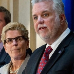 Ontario Premier Kathleen Wynne and Quebec Premier Philippe Couillard sign unprecedented bi-provincial agreement to tackle climate change.