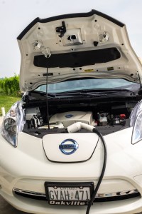 An electric car being re-charged