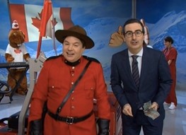 Mike Myers, decked out in a Mountie uniform, joins HBO's John Oliver for a lampooning of Canada's federal election. The beaver behind Myers is taking Stephen Harper's place on the piano.