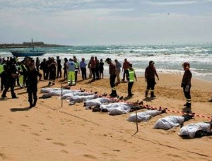 Bodies of drowned Syrian refugees lined up along the Mediterranian shores. Some official estimates place the number of drownings so far this year at more than 2,300.