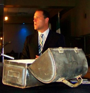 St. Catharines, Ontario Mayor Walter Sendzik delivers his 'State of the City' address with his grandfather's lunch pail sitting in the foreground. Photo by Doug Draper
