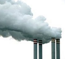 Four chimneys releasing a fantastic amount of smoke.