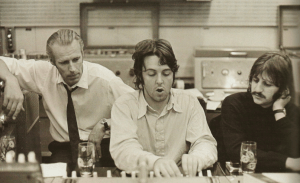 George Martin, with Paul McCartney and Ringo Starr at Abbey Road studios in the late 1960s.