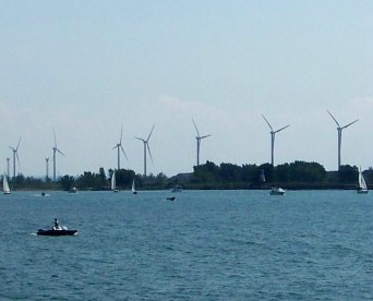 Wind energy turbines in action along the shores of Lake Erie in the Buffalo, New York area. File photo by Doug Draper