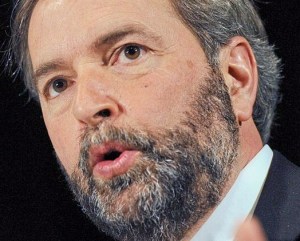 Canada's NDP Leader Tom Muclair will stay on until the party picks a successor.