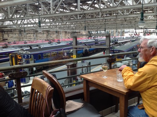 Don Alexander looking over a mass of trains