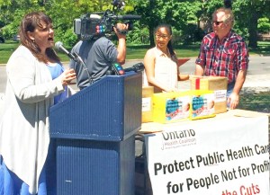 Ontario Health Coalition director Natalie Mehra speaks at May 31st Queen's Park rally for saving hospital services