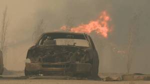 Wildlfre engulfs car near northern Alberta tar sands this spring