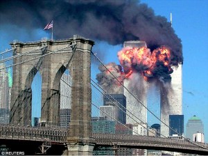 The twin towers of the World Trade Center in flames on the morning of 9/11