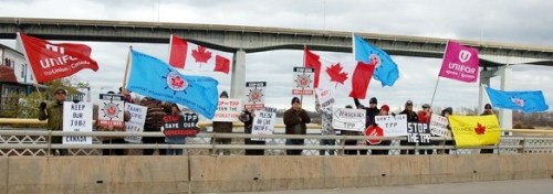 One of the many past rallies against TPP trade deal - this one on a Welland Canal bridge crossing in St. Catharines, Niagara - File photo by Joanne McDonald.