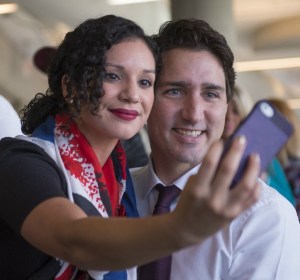 Dark clouds may be closing in on the days of sunny way selfies and roses for Canada's Prime Minister Justin Trudeau