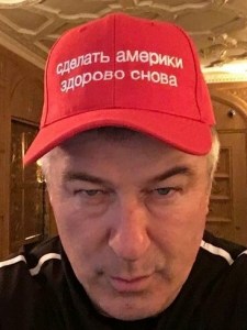 American actor Alec Baldwin, who plays Trump on Saturday Night Live, wears a had reading; 'Make America Great Again' in Russian.