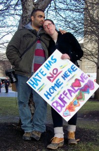 Looking on as Buffalo Mayor Byron Brown and others speak at January 21st rally in support of Women's March on Washington. Photo by Doug Draper
