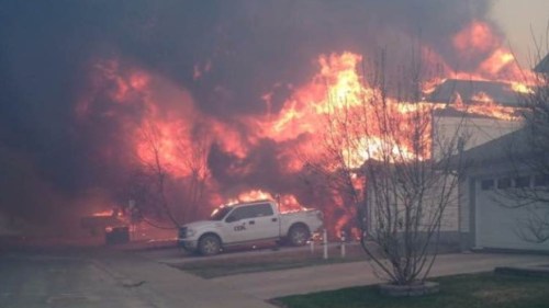 Last years's unprecedented wildfires near the tar sands of northern Alberta seem a distant memory now as Canada's Prime Minister Justin Trudeau applauds Trump's push to move forward with the Keystone XL pipeline. Not to worry though. After all, insists Trump, climate change is a hoax.