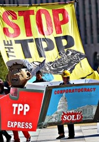 Signs like the one in this photo - this one in the U.S. - have been held up by numberous citizens in both the United States and Canada over the past year. U.S. candidates like Trump, Bernie Sanders and, later, even Hillary Clinton, took them to heart. In Canada, Justin Trudeau so far seems determined to sign the TPP trade deal, despite any and all opposition.