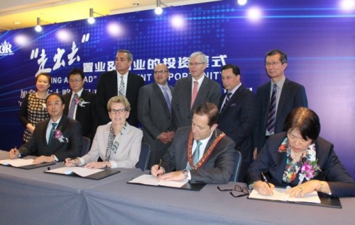 Ontario Premier Kathleen Wynne with Niagara Falls Mayor Jim Diodati in China in November 2015, participating in the signing of a "memorandum of understanding" for the controversial Thundering Waters development project in Niagara Falls, Ontario. The contents of that Memorandum of Understanding have yet to be publicly disclosed.